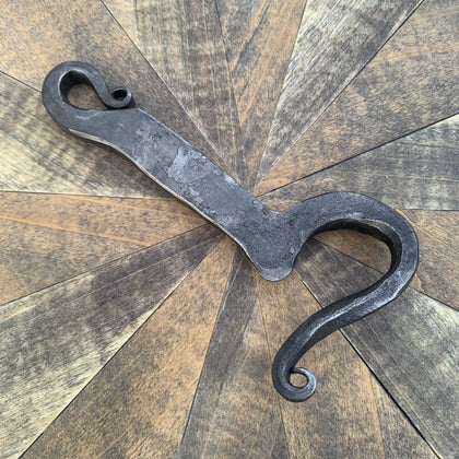 Scrolled bottle opener